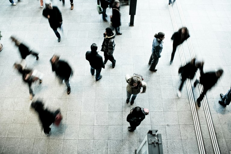 Professionals from different cultures connecting during relocation, reflecting a human-centered global mobility strategy.