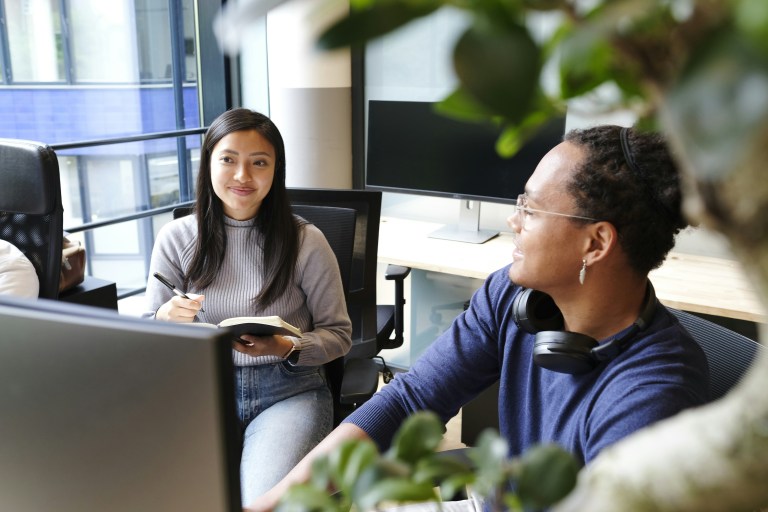 Manager talking with an hr consultant ready to outsource hr.