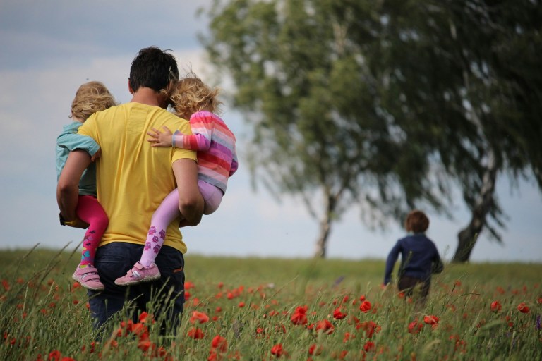International family representing kinderopvangtoeslag with their child in the Netherlands
